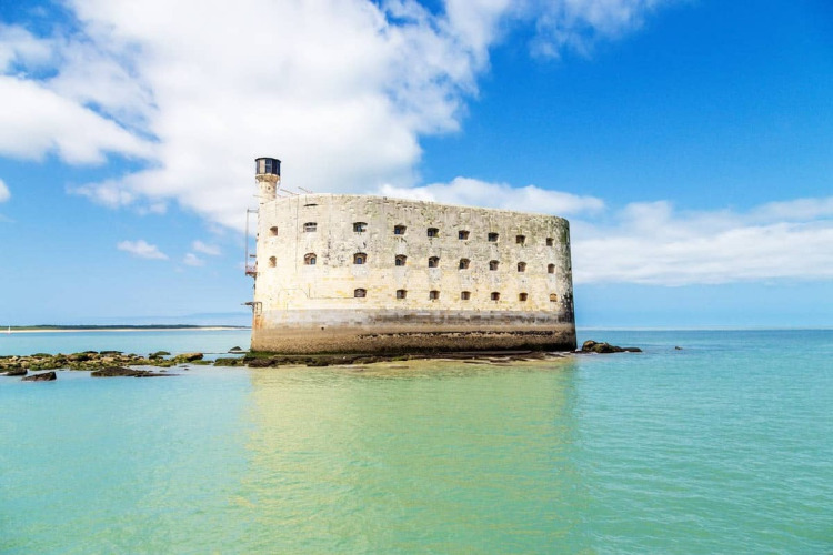 Historic fort surrounded by turquoise sea near Saint-Trojan-les-Bains on Oléron Island, Nouvelle-Aquitaine, France.
