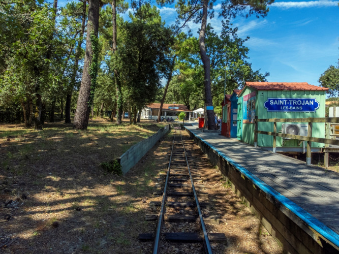 Narrow-gauge train station at Saint-Trojan-les-Bains in a wooded area at Flower Camping Monplaisir, France.