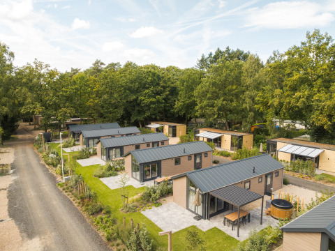 Aerial view of Doornenburg Lodge Comfort with hot tub and sauna at Veluwepark de Bosgraaf, Netherlands.