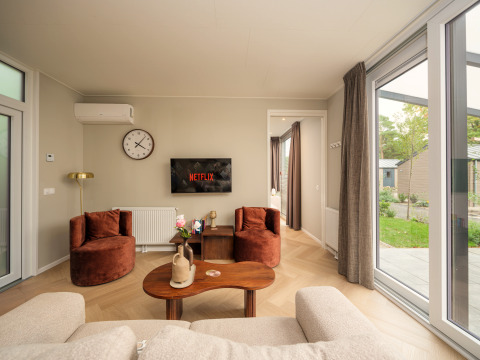 Soggiorno elegante al Rosendael Comfort con Netflix, poltrone comode e vista sul giardino, Veluwepark de Bosgraaf.