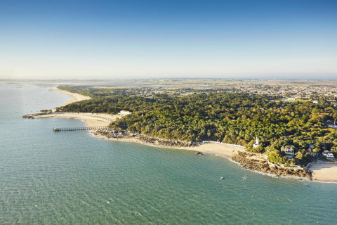 Aerial view of coastline at Flower Camping Au Bois Des Biches holiday park in Pays de la Loire, France.