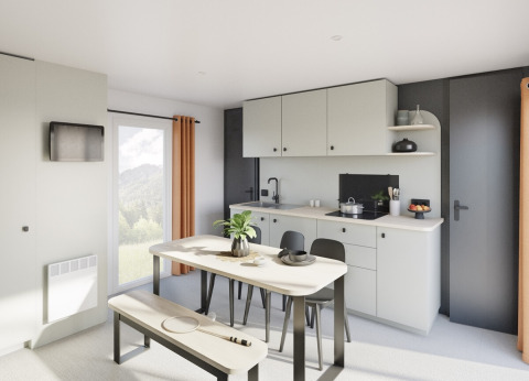 Moderne keuken en eetruimte in Stacaravan Confort PLUS bij Flower Camping Au Bois Des Biches, Frankrijk.