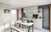 Moderne keuken en eetruimte in Stacaravan Confort PLUS bij Flower Camping Au Bois Des Biches, Frankrijk.