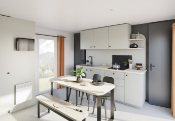 Moderne keuken en eetruimte in Stacaravan Confort PLUS bij Flower Camping Au Bois Des Biches, Frankrijk.