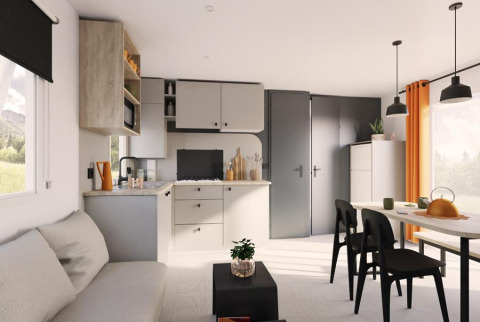 Moderne woonkamer en keuken in de Limburg Lodge op Camping 't Geuldal, Nederland, met lichte inrichting.