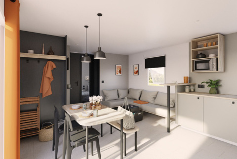 Moderne woon- en eethoek van Limburg Lodge XL op Camping 't Geuldal, Nederland, licht en ruim opgezet.