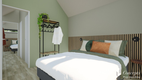 Soveværelse i Cosy Lodge på Camping Si-Es-An, Nederlandene, med grønne vægge og moderne indretning.