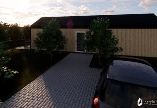 Indgang til Reestdal-lodgen ved Camping Si-Es-An i Holland med parkering og træbeklædt facade.