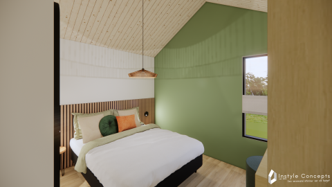 Moderne soveværelse i Reestdal lodge, Camping Si-Es-An, Holland med grønt accentvæg og hyggelig indretning.