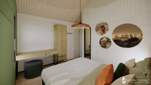 Moderne soveværelse på Reestdal lodge i Camping Si-Es-An, med naturelementer og træloft.