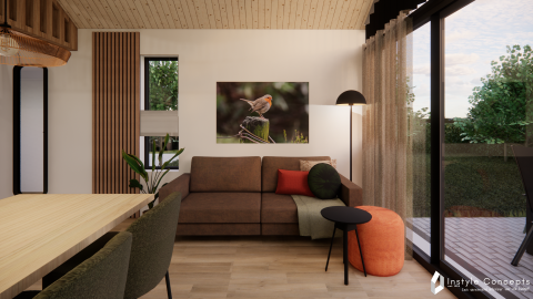 Moderne stue i Reestdal lodge ved Camping Si-Es-An, Holland, med brun sofa og naturudsigt.