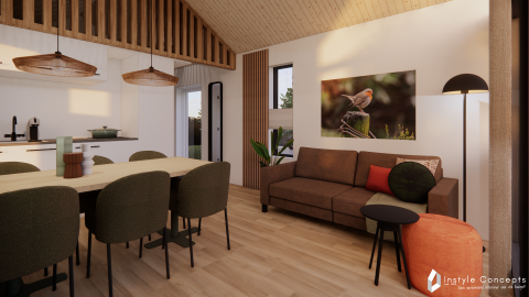 Moderne stue i Reestdal lodge på Camping Si-Es-An i Nederlandene med træloft og hyggelig indretning.