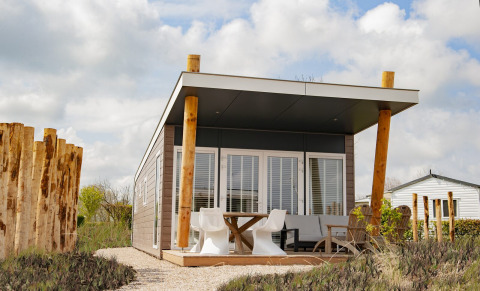 Wellness lodge with terrace - Camping Zonneweelde - Nieuwvliet, Zeeland, Netherlands
