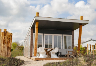 Wellness lodge with terrace - Camping Zonneweelde - Nieuwvliet, Zeeland, Netherlands
