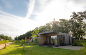 Modern Holiday Villa Amalia 2 with sauna at Hofparken Wiltershaar, nestled in nature in the Netherlands.