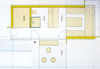 Floor plan of Haus Wasser cabin in Germany, showing bedroom, shower, kitchen/dining, and terrace.