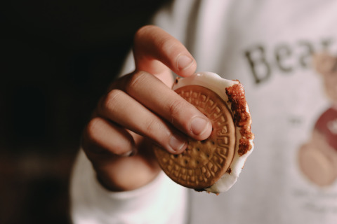 A person holds a filled cookie sandwich at Feather Down De Oude Melkstal holiday park in North Brabant.