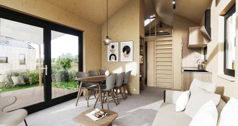 Modern lodge-interieur bij Dordogne Deluxe in La Draille, Frankrijk, met eethoek en slaapzolder.