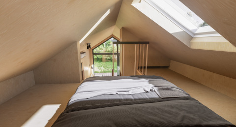 Zolderkamer in Dordogne Deluxe-lodge bij La Draille, Frankrijk, met dakraam en gezellig tweepersoonsbed.