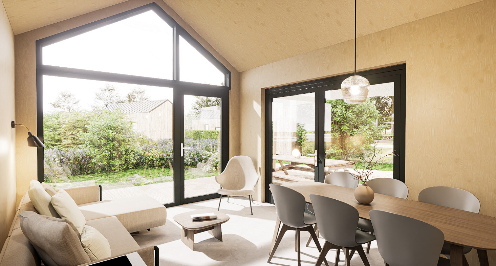 Lichte woon- en eetruimte in Dordogne Deluxe lodge bij La Draille, Frankrijk, met grote ramen en moderne inrichting.
