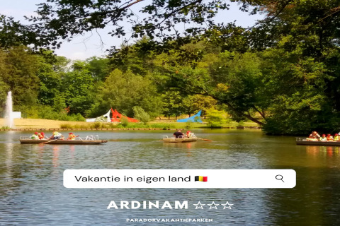Families enjoy boating on a lake at Holiday Park Ardinam in Belgium, surrounded by trees and playgrounds.