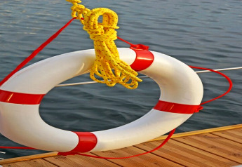 Lifebuoy with rope on houseboat Floating 44 - Boot 2 / 3 Personen, moored at waterside in Germany.