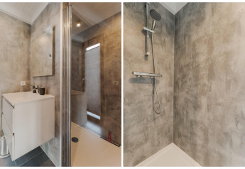 Modernes Badezimmer mit Dusche und Waschbecken, Betonoptik, im Hausboot Boat House Stavoren, Niederlande.