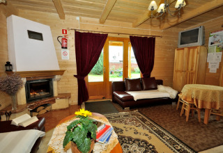 Knusse woonruimte in chalet 'A fabulous house in the mountains' met haardvuur in Tsjechië.
