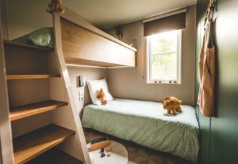 Cameretta con letti a castello presso O'Hara Lodge Comfort, Arden Parks Tulderheyde in Belgio.