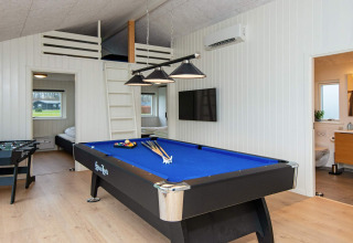 Game room with pool table, foosball, sleeping loft, and bathroom in 8 person holiday home in Sydals, Denmark.