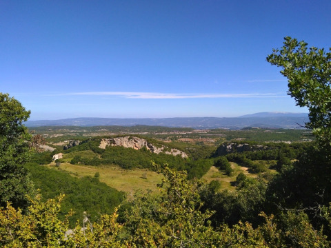 Scenic landscape view at Domaine des Chênes Blancs holiday park in Provence-Alpes-Côte d’Azur, France, under a clear sky.