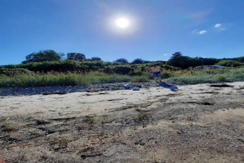 Journée ensoleillée sur la plage près d'une maison de vacances pour 4 personnes à Haderslev, Danemark.