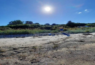 Journée ensoleillée sur la plage près d'une maison de vacances pour 4 personnes à Haderslev, Danemark.