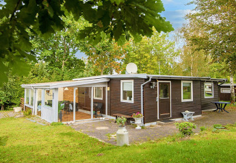 Attraktivt sommerhus til 4 personer i Allingåbro med have, terrasse og hyggelig atmosfære.