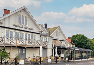 Vue extérieure de Sandviks Hamnkrog, maison de vacances pour 3 personnes à Löttorp, Suède, et terrasse.