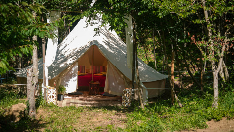 Glamping tent accommodation at Azienda Agricola Il Granello in Italy, surrounded by nature, ideal for luxury camping.