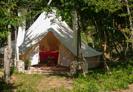 Glamping tent accommodation at Azienda Agricola Il Granello in Italy, surrounded by nature, ideal for luxury camping.
