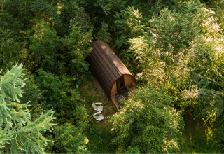 Luksuriøs glampinghytte skjult blandt træerne ved Buitenplaats Beekhuizen - Glamping Veluwe i Holland.