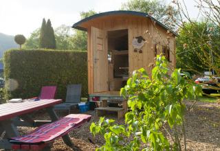 Glamping accommodation or camping at Camping Fortuna am Neckar in Baden-Württemberg with a gypsy wagon.