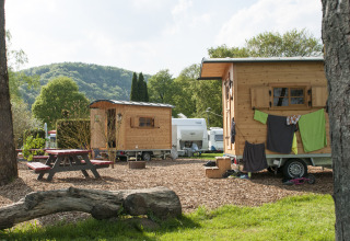 Glamping at Camping Fortuna am Neckar with gypsy wagons in Baden-Württemberg, surrounded by nature.