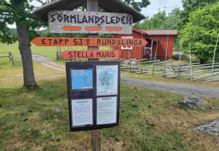 Signpost on the Sörmlandsleden trail near Sävö Bed and Breakfast Glamping in Södermanland, Sweden, summer