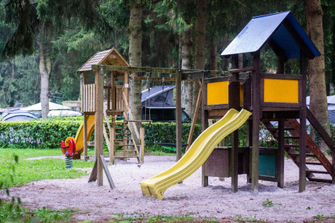 Playground with slide and swings at Camping de Marcourt - Tipitenten in Belgian Luxembourg.