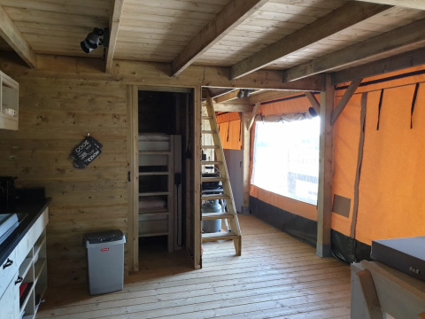 Interior view of glamping accommodation at De Betuwse Hofjes - Betuwe Lodges in Gelderland, Netherlands.