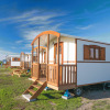 Glamping accommodation at Campingplatz am Nordseestrand with gypsy wagons in scenic Oost-Friesland