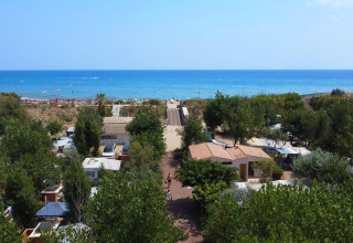 Glamping at Camping Beauregard Plage with sea view in Languedoc-Roussillon, France, near the beach.