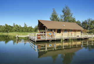 Glamping accommodation WaterLodges Brabant at Recreatiepark TerSpegelt, cozy tent lodge over the lake.