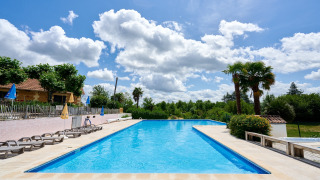 Piscina exterior - Villatent - Camping Lestaubiere - Douville, Dordoña, Francia