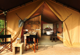 Inviting glamping accommodation at Kimaro Farmhouse, Burgundy, with cozy safari tent and rustic interior