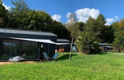 Glamping accommodation at Wellnester Camping near Losheim am See – Tiny houses Saarland with green views.