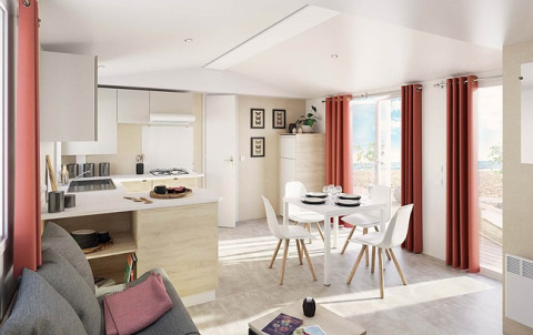 Moderne glampingaccommodatie bij Camping Wallersee - Stacaravans Salzburg met keuken en eetruimte.